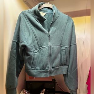 Universal thread cropped green cotton jacket